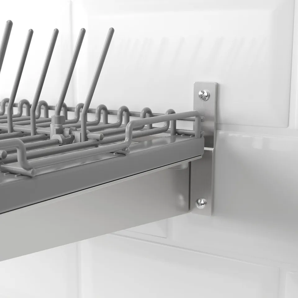 Grey stainless steel kitchen organiser, securely mounted on wall, designed for durability and efficient space usage.