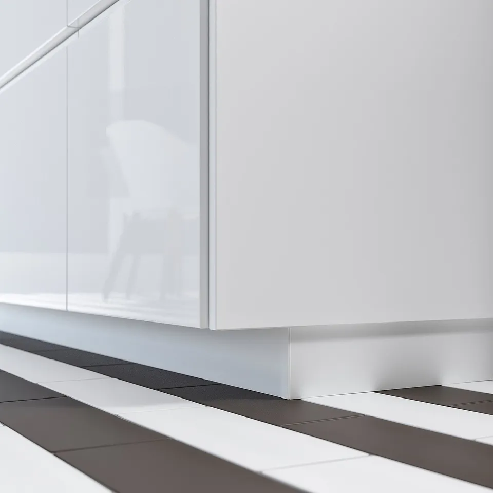 White glossy kitchen cabinet with sleek, rectangular design.