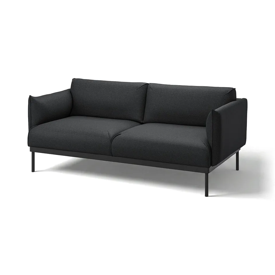 Dark grey ÄPPLARYD sofa. Modern, comfy design with slim legs. Perfect for relaxing.