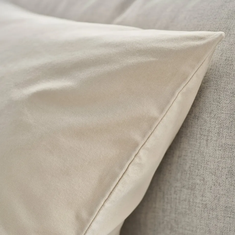 Beige velvet cushion cover, smooth texture, neatly stitched