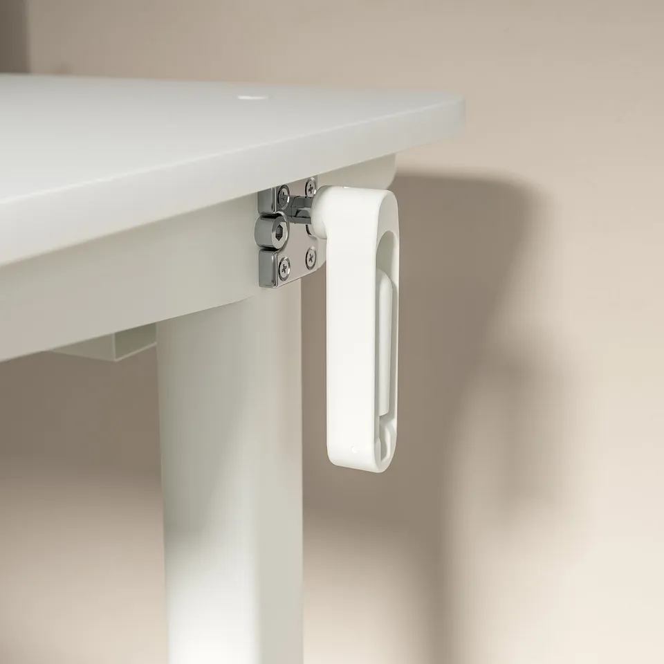 White sit-stand desk part with crank handle.