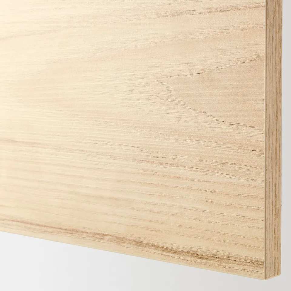 Light wooden surface, smooth texture, uniform grain pattern.