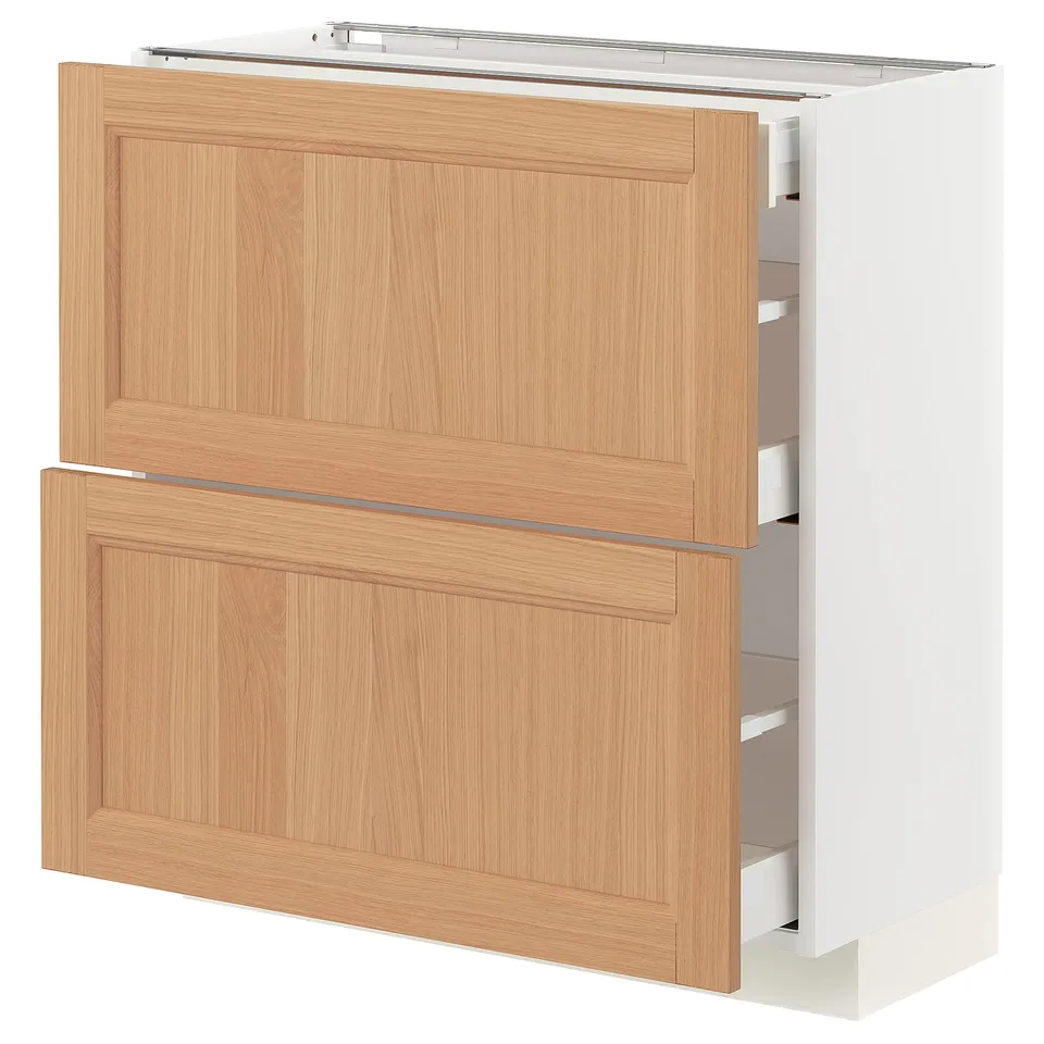 METOD kitchen unit with oak drawers. White base, wooden panel design, two large drawers, sleek modern aesthetic.