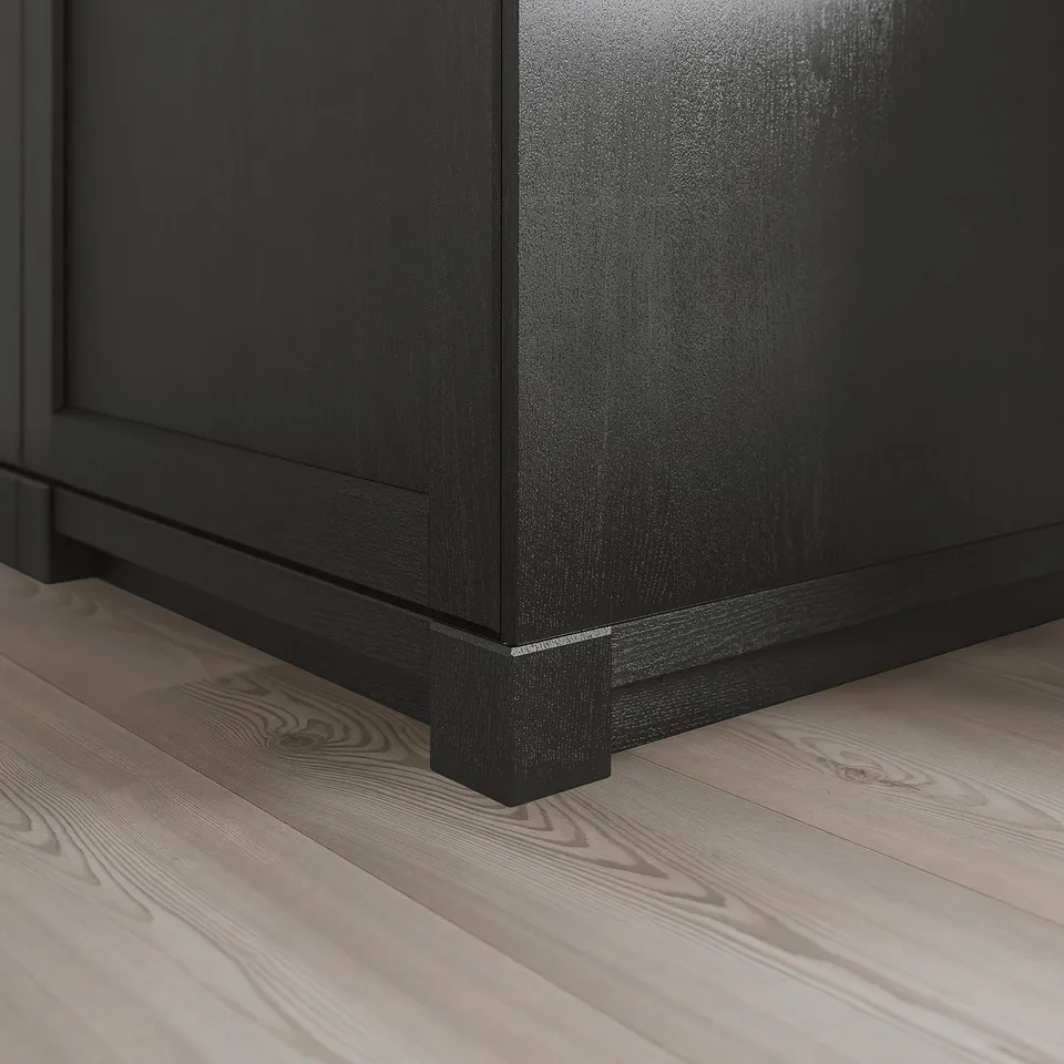 Black wooden cabinet leg, part of the LERHYTTAN kitchen series, designed to enhance rustic style.