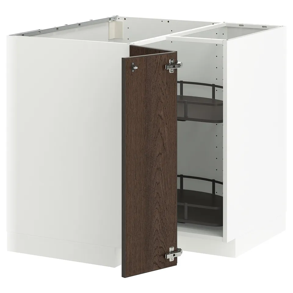 White kitchen cabinet with dark brown door, shelves, and metallic hinges.