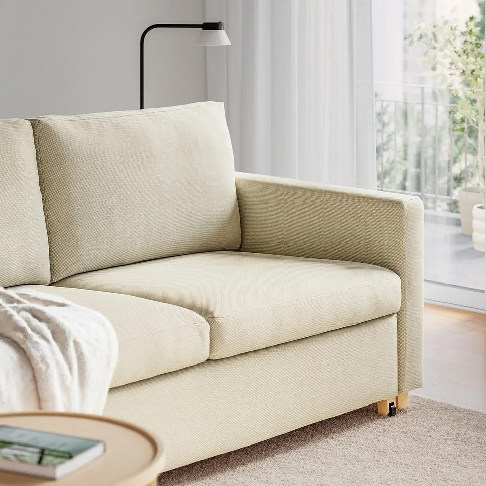 Beige sofa-bed with soft, supportive cushion, removable cover, converts to 160 cm wide bed for two.