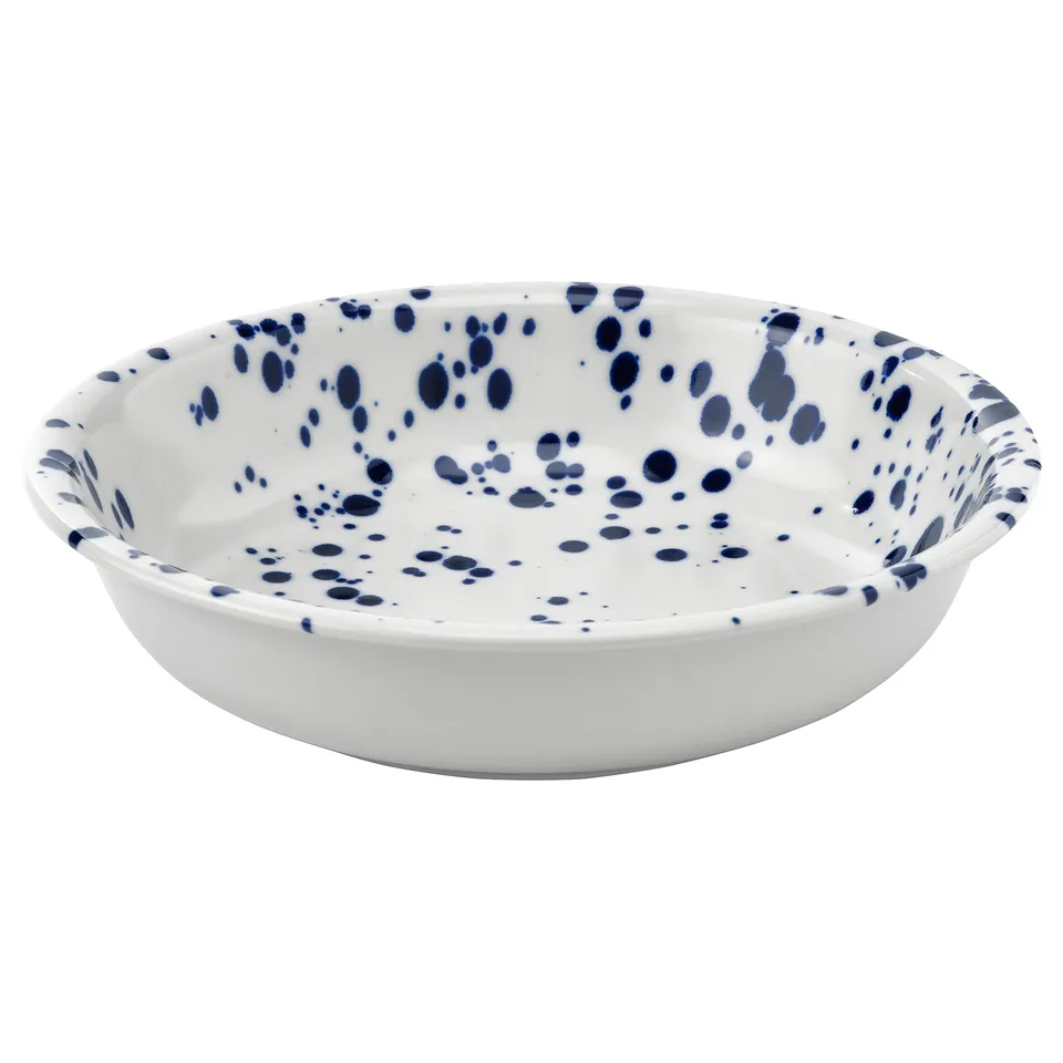 White ceramic bowl with blue splatters.