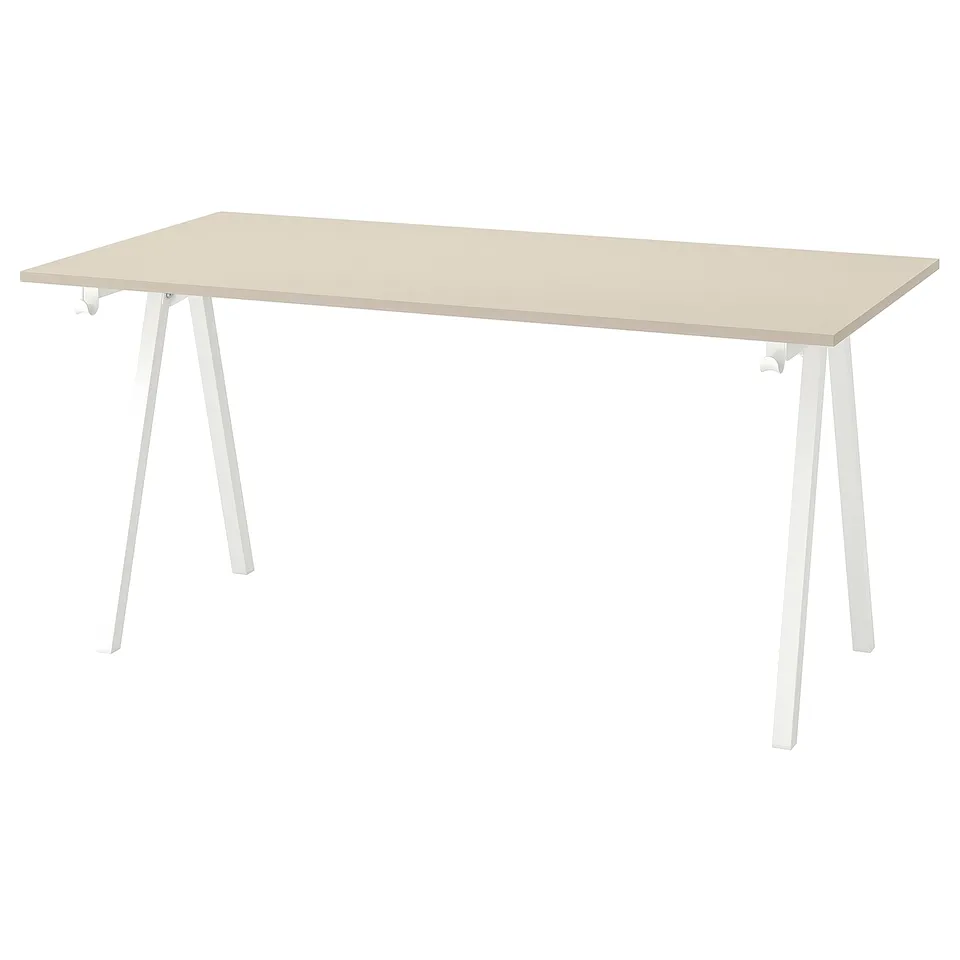 Ikea TROTTEN light grey desk, rectangular, white legs, wooden top, minimalist design.