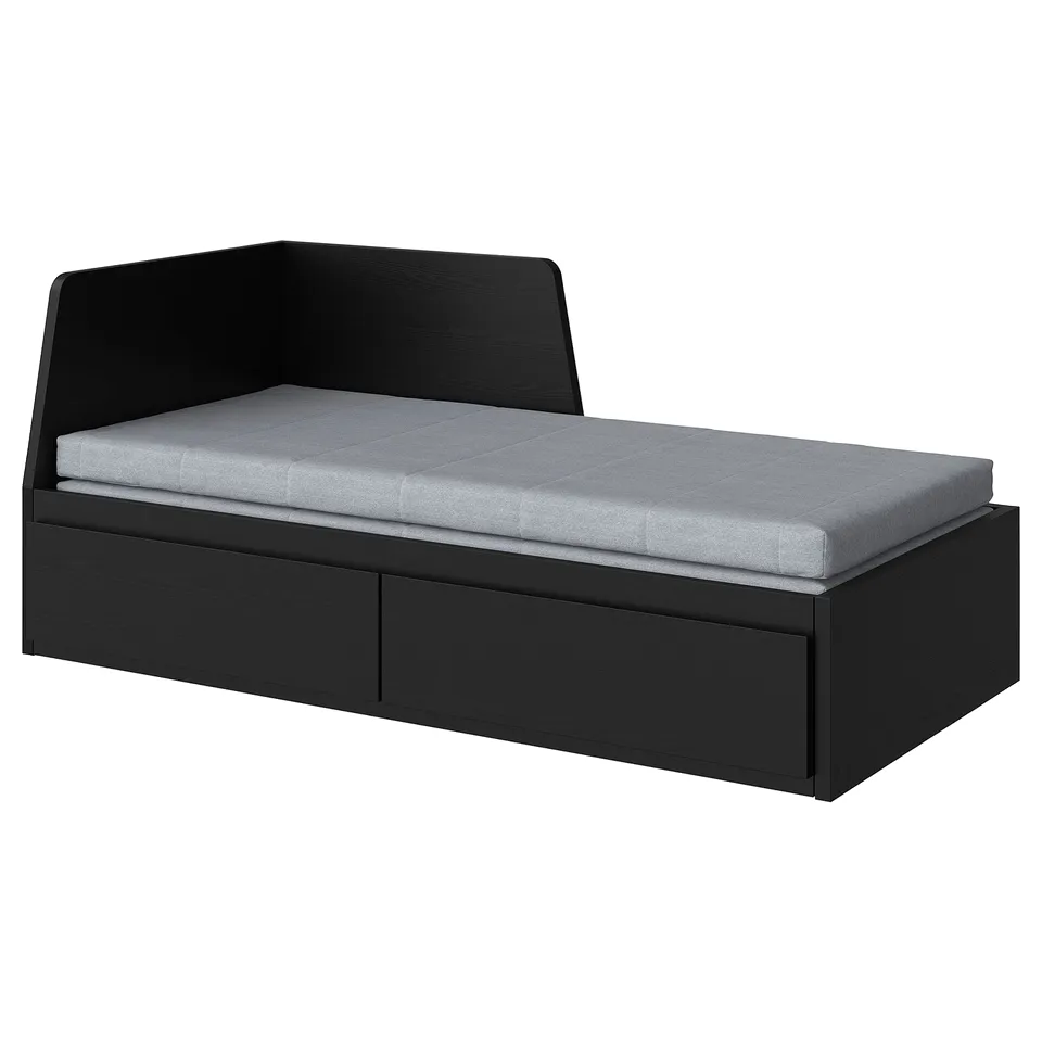 Black FLEKKE convertible sofa-bed with drawers and grey mattress, modern and space-saving design.