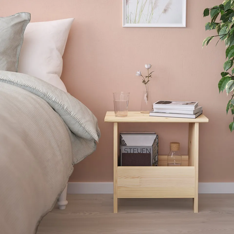 PERJOHAN light wood bedside table with storage. Small, practical, fits beside bed.