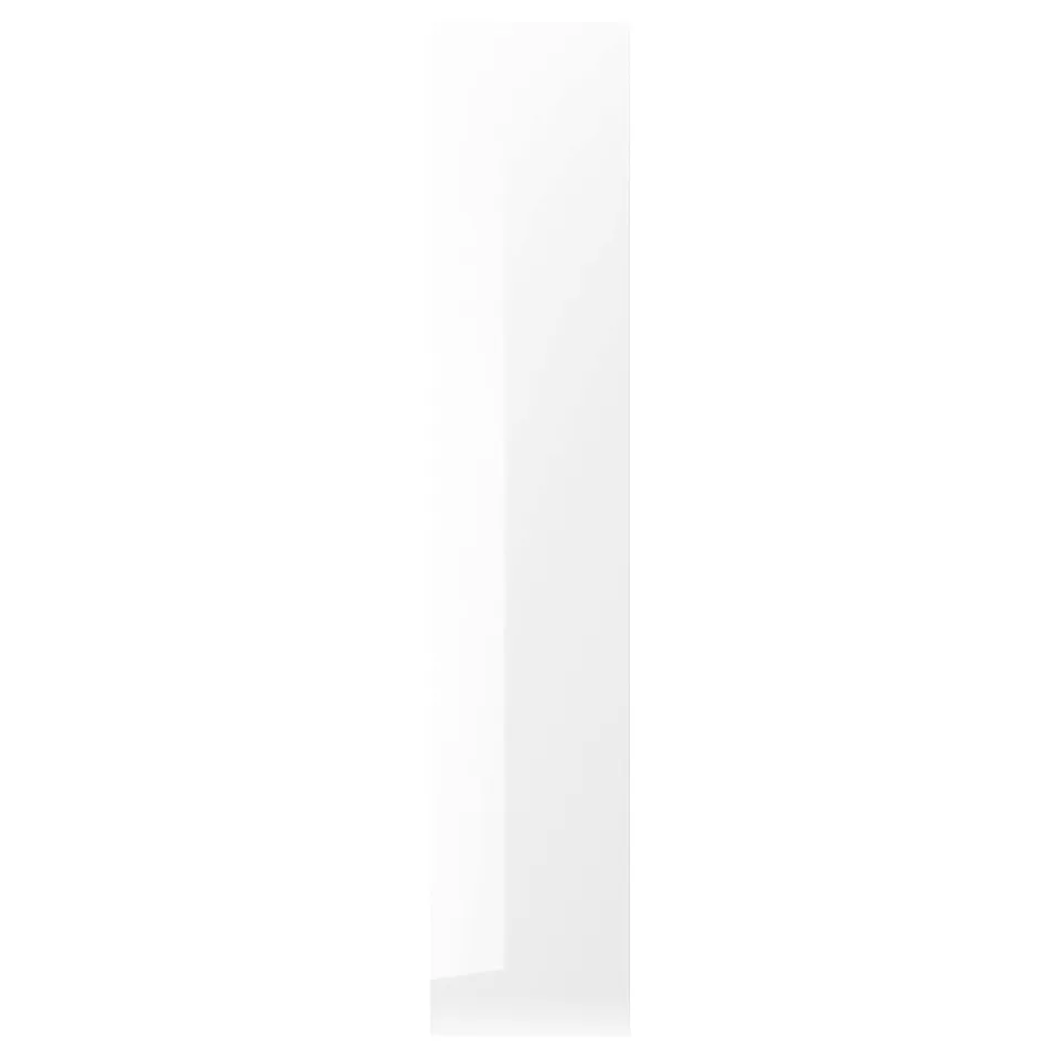 A white, glossy RINGHULT kitchen cabinet door with sleek, straight lines. The door is made of fibreboard with a smooth, stain-resistant finish.
