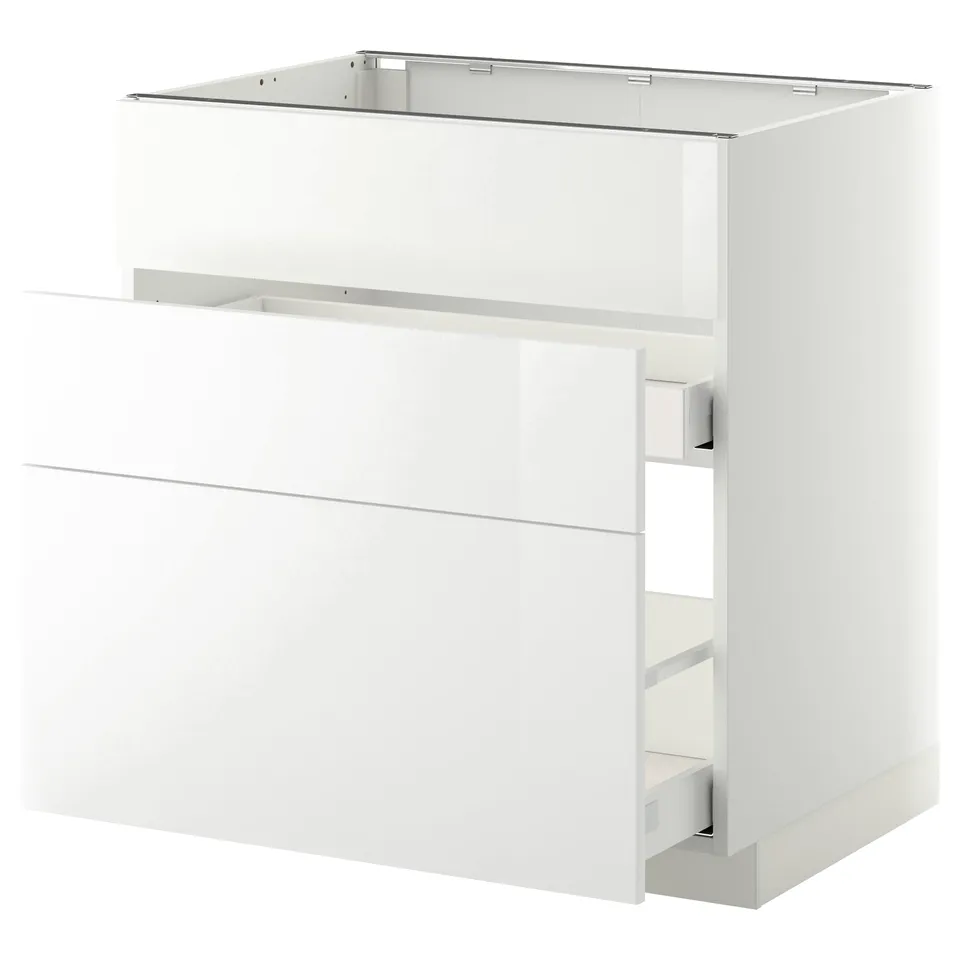Modern METOD kitchen cabinet, white, glossy, rectangular, with three drawers, sleek design.