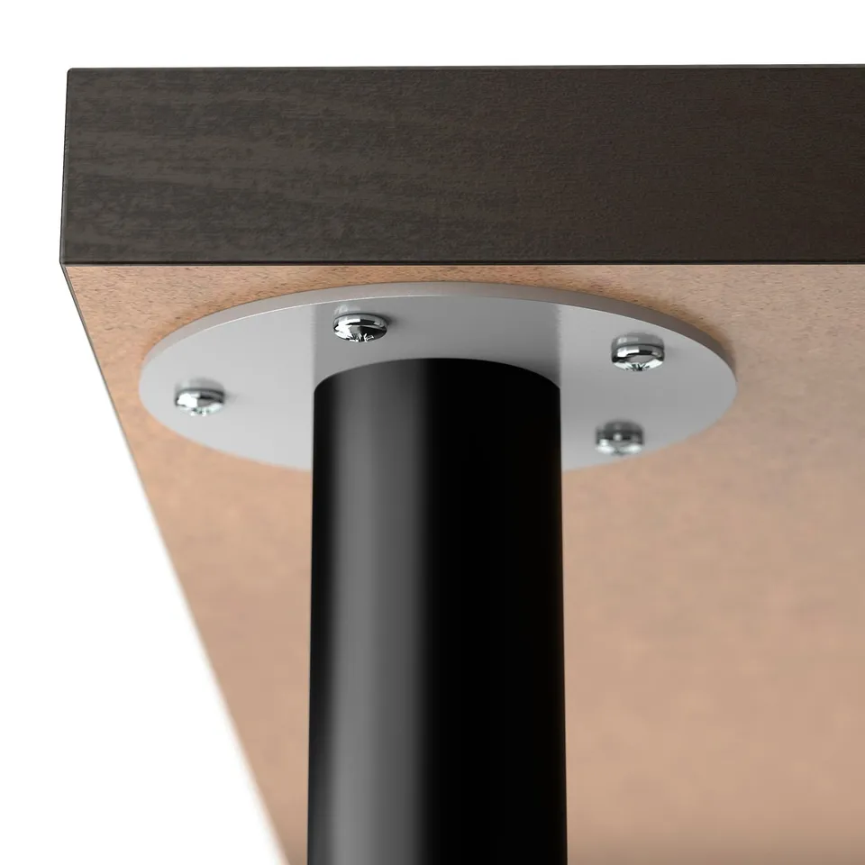 Close-up of modern tables sturdy metal leg attached to smooth wooden top with metallic screws.