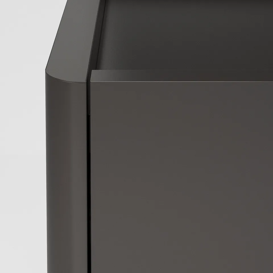 Modern black cabinet with sleek, smooth finish and clean lines, featuring metal handles and edges, showcasing high-quality design.