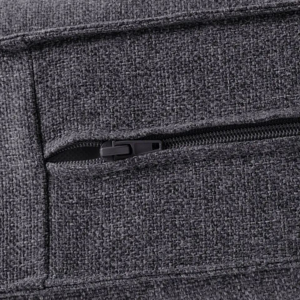 Close-up of high-quality sofa pocket, showcasing durable zip and texture of gunnared fabric.