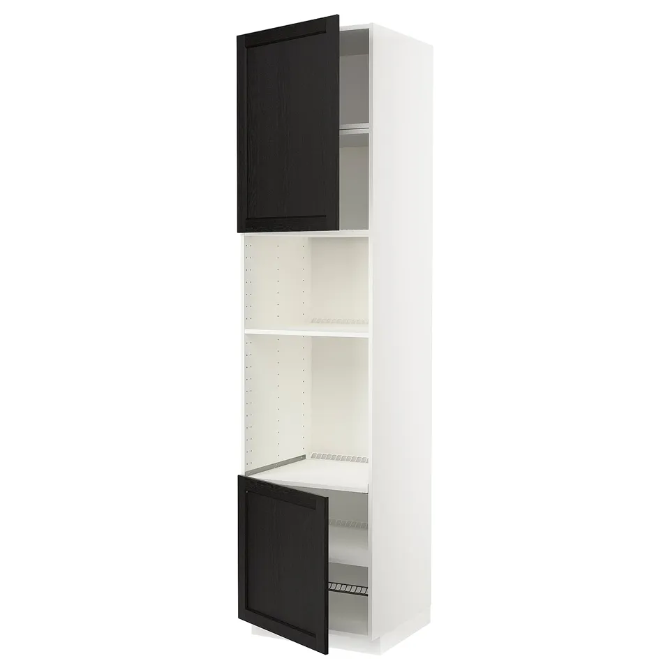 A white METOD kitchen cabinet with black stained wooden doors and an adjustable shelf.