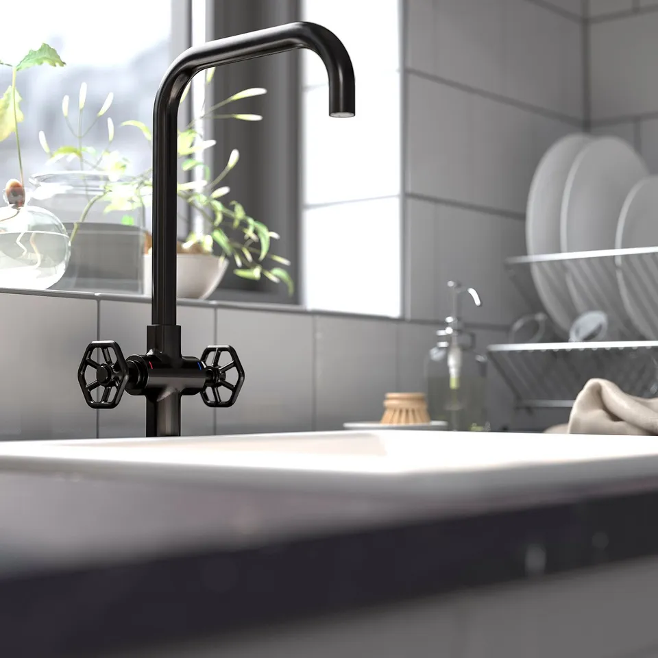 Black GAMLESJÖN tap with high arc over sink, modern industrial design
