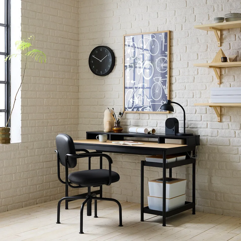Black & wood MULLSJÖ desk with storage & cable management in home office.