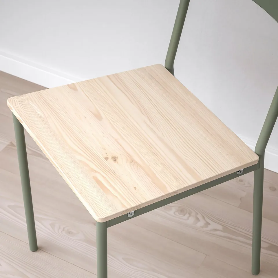 Small, modern side table with light wooden top and green metal legs. Minimalist, sturdy design.