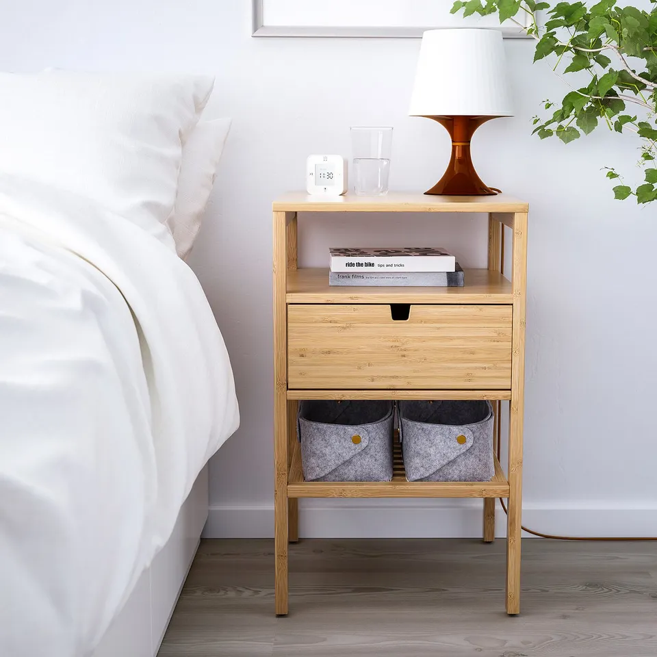 NORDKISA bedside table with lamp, books, drawer, shelves