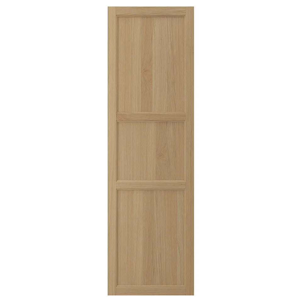 Wooden door, light brown, rectangular panels, solid oak frame, modern design.