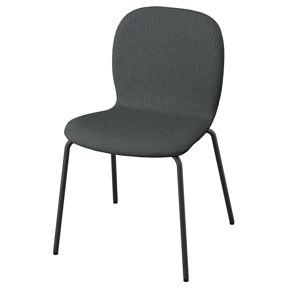 A skalsta chair. Its black with a rounded back and seat, supported by black metal legs.