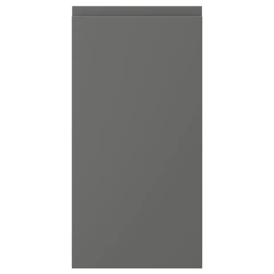 Grey kitchen cabinet door with sleek design and integrated handles.
