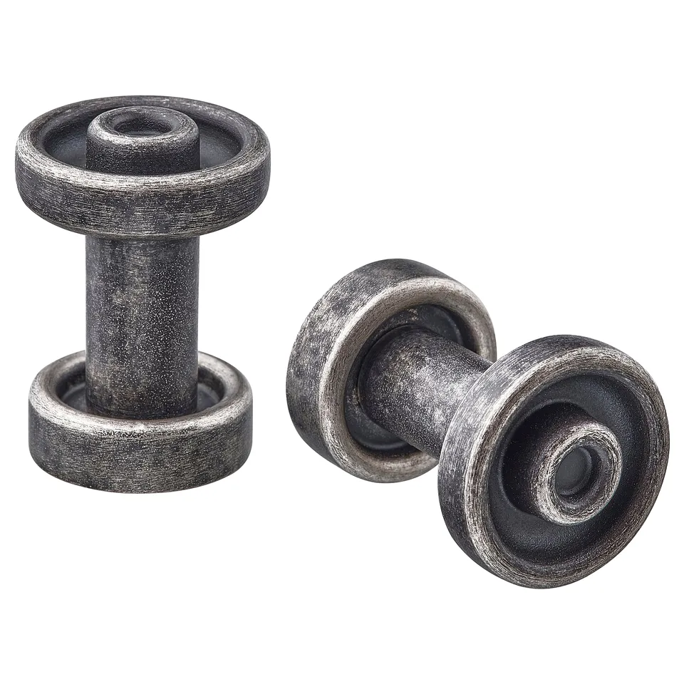 Pair of round black SKRUVSHULT knobs, textured finish, traditional design.