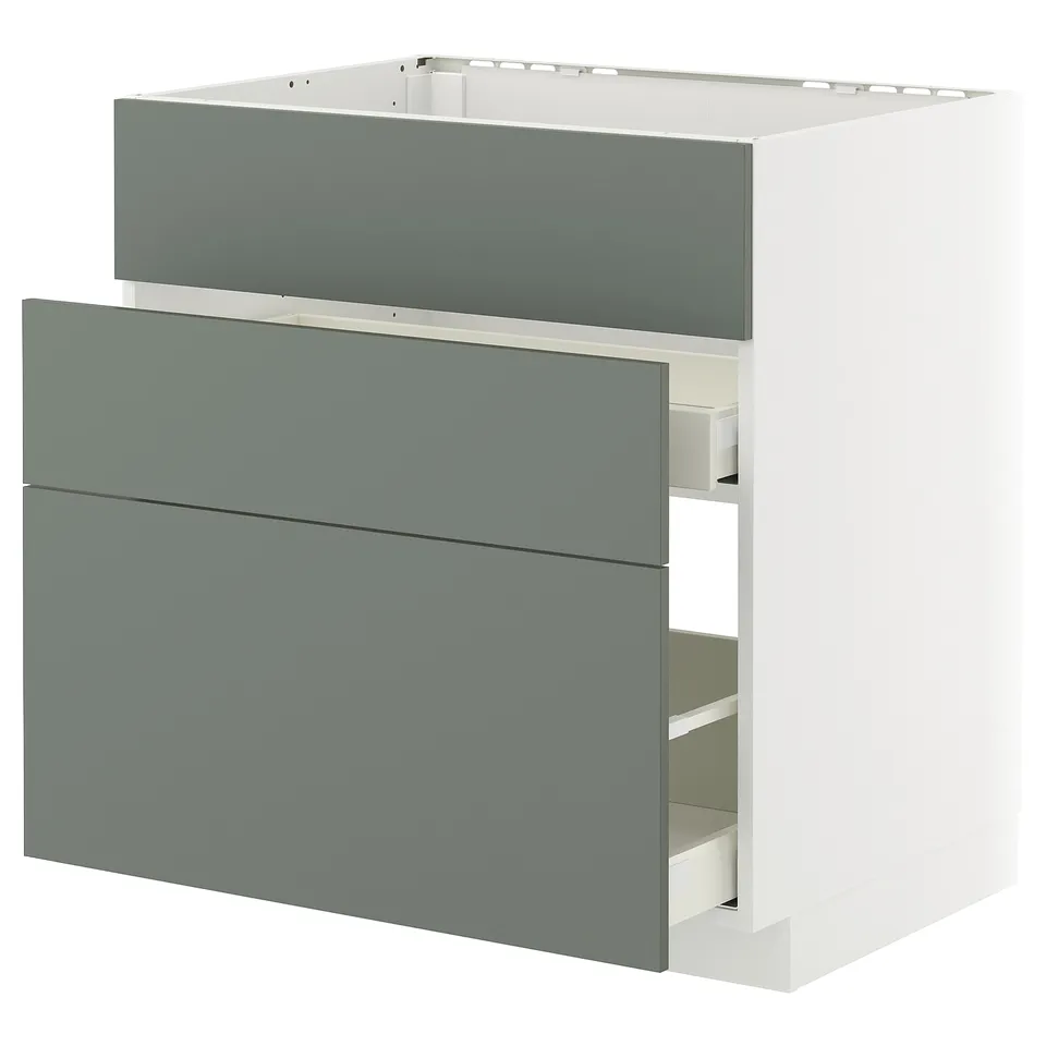 A modern, grey-green METOD kitchen base cabinet with three smooth drawer fronts and a boxy shape.