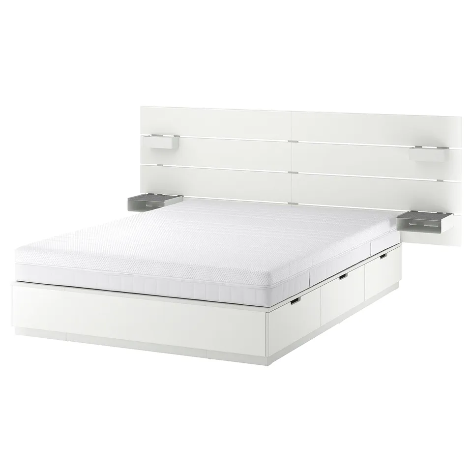 White NORDLI bed, modern design, with built-in storage drawers and headboard shelves.