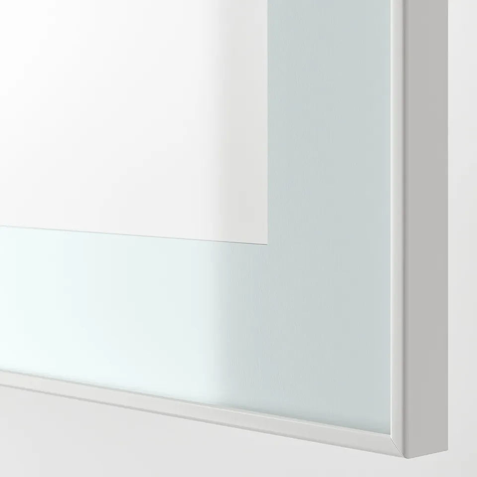Close-up: GLASSVIK clear glass door, pristine white frame, showcasing quality and modern design.