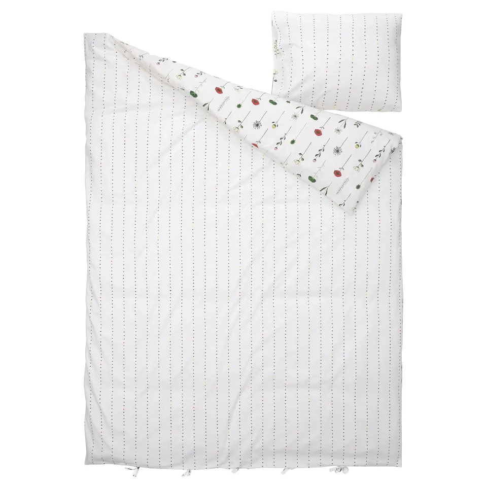A NATTSLÄNDA duvet cover set, white with floral or dotted patterns, cotton and lyocell, rectangular with ties.