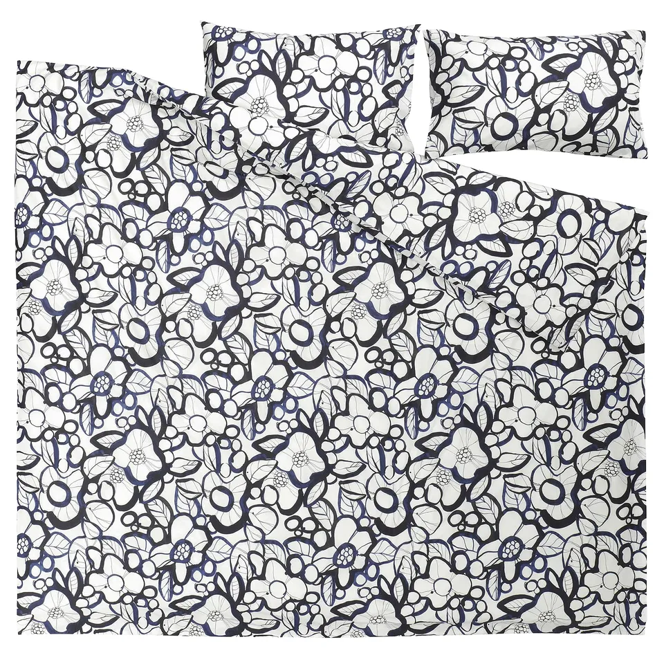 The HÄRLIR duvet cover set a bold black-blue floral pattern on a soft, breathable cotton/lyocell blend.