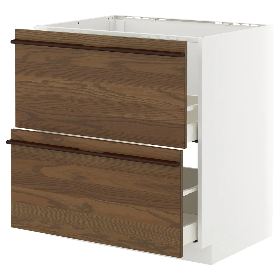 Modern kitchen cabinet, white & brown. Dark wood drawers, smooth pulls, sleek design.