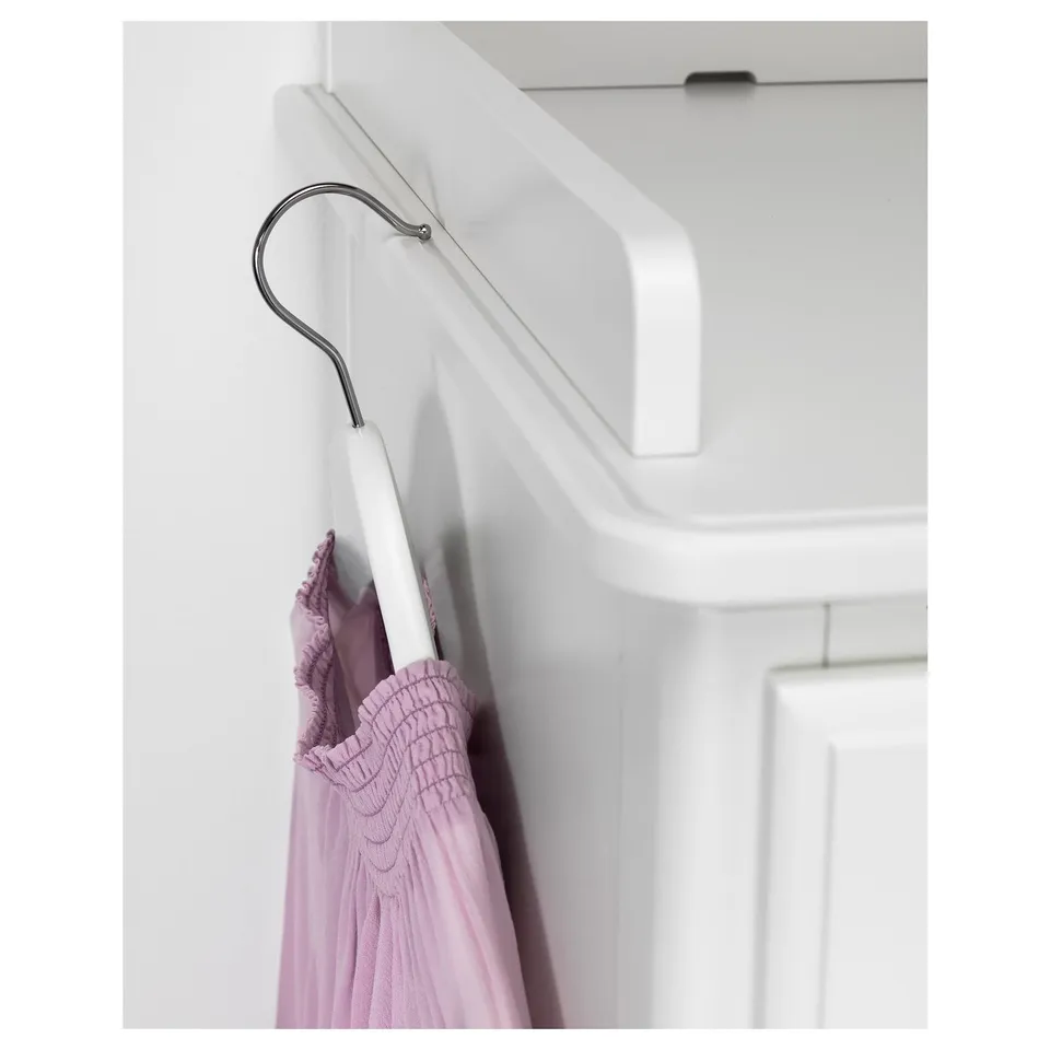 A sleek white TYSSEDAL wardrobe with a sturdy chrome hook holding a purple garment, showcasing its quality and practical design.
