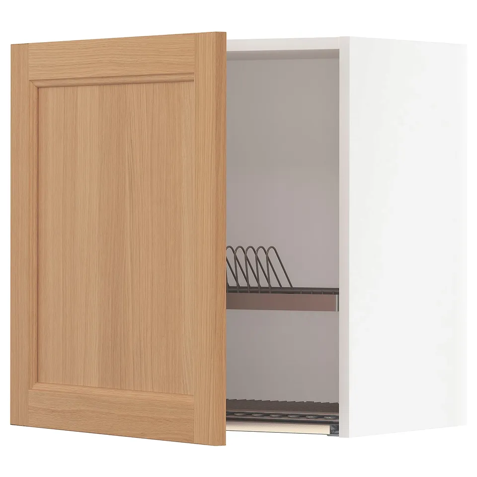 An open light wood-toned wall cabinet with a metal dish rack from the METOD kitchen system.