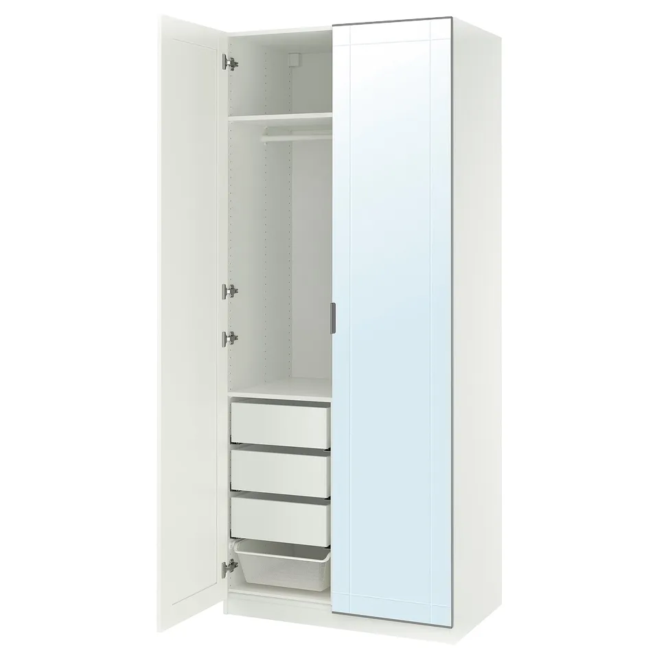 White PAX wardrobe, open: mirrored doors, shelves, drawers.