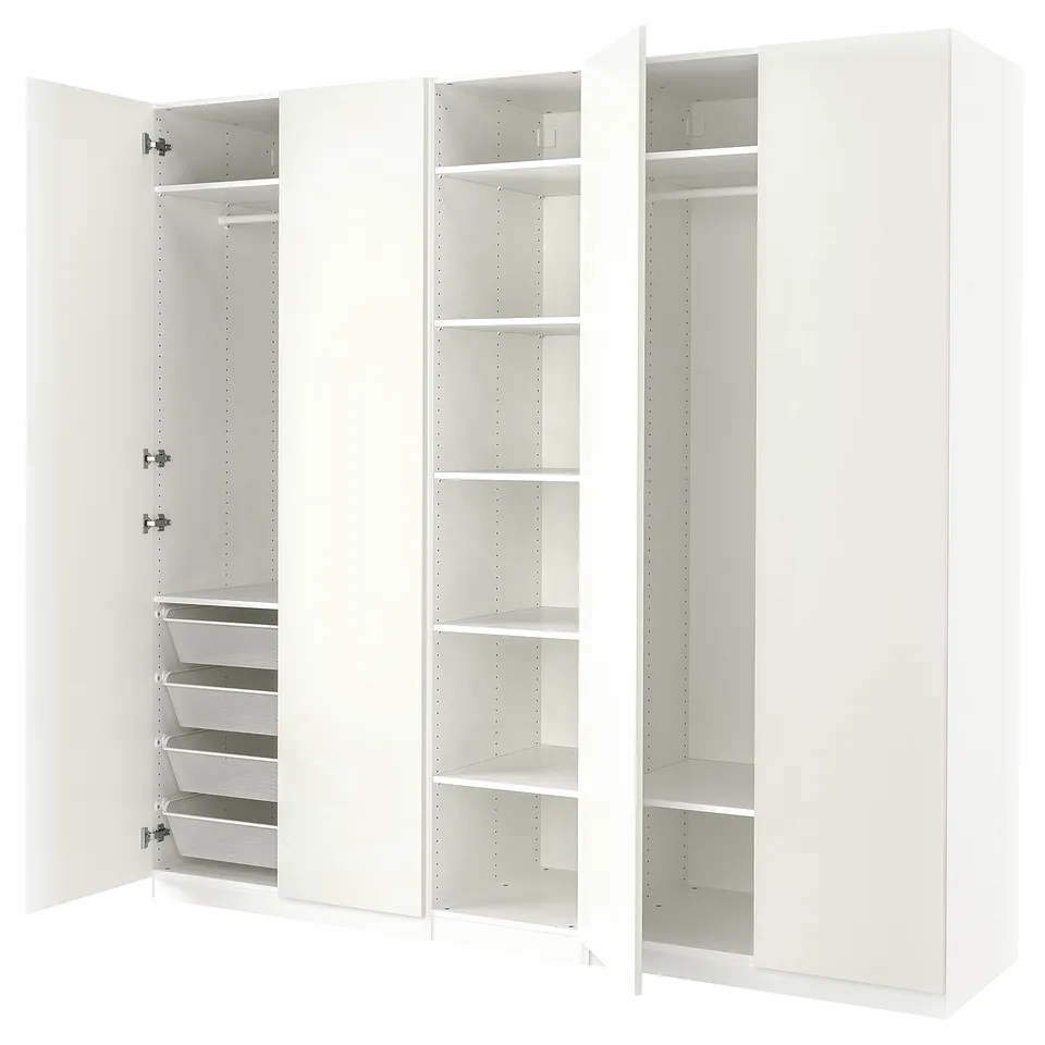 An all-white ikea PAX wardrobe with open doors, displaying multiple shelves and mesh baskets.