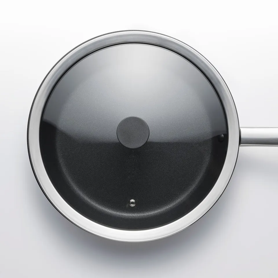 Stainless steel frying pan with tempered glass lid and silicone gasket.