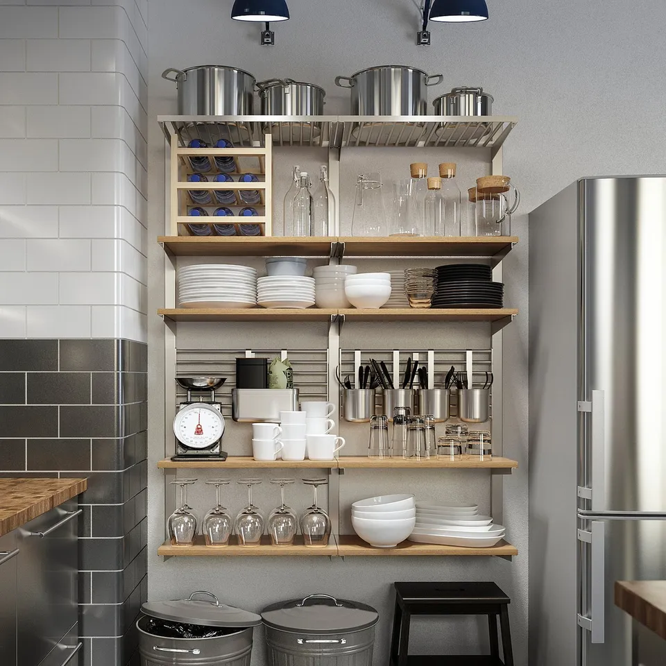 Modern kitchen with KNODD bins, dishes, stainless steel, and wood shelves.