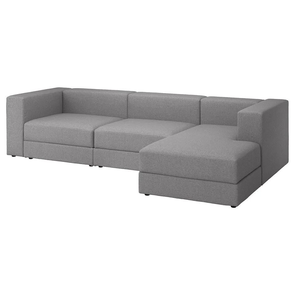 Grey JÄTTEBO modular sofa with chaise, modern design, soft fabric, angled corner.