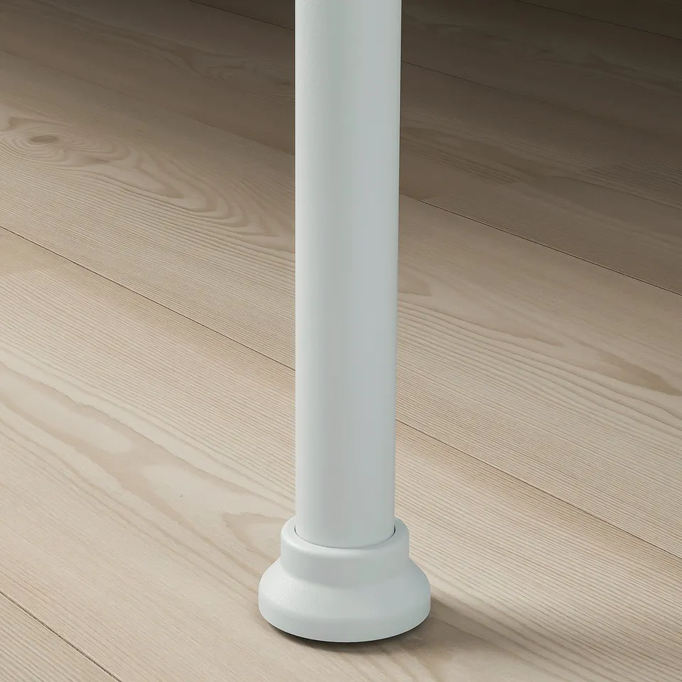 Cylindrical object on wooden floor, stable and robust.
