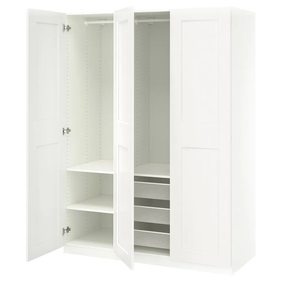 White PAX wardrobe with open doors revealing shelves and mesh baskets.