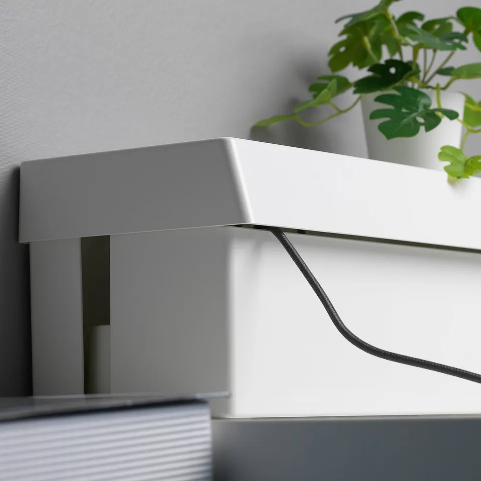 White SÄTTING box with cable hole, keeping desk tidy by hiding cords.