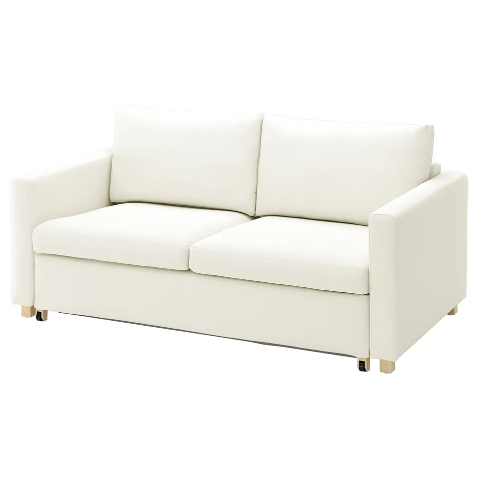 A white IKEA SALTSJÖBADEN sofa-bed with clean lines and a minimalist design.