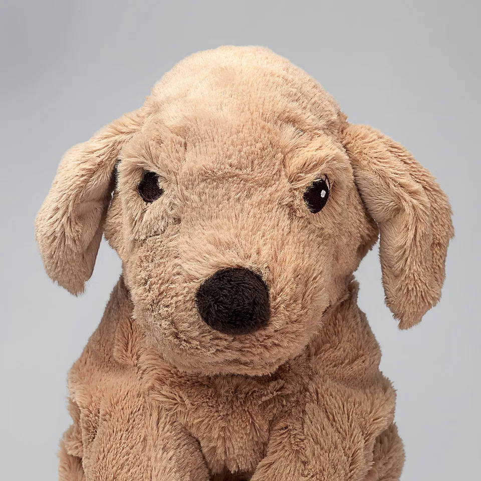 Soft plush dog toy, nostalgic and tactile, with detailed made from high-quality polyester.