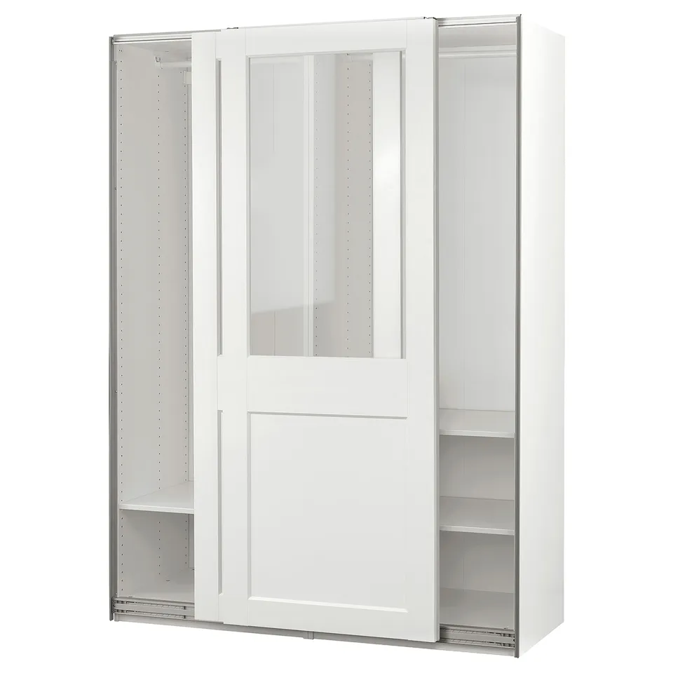 A white PAX wardrobe with glass top doors, sliding doors, and shelves for storage.