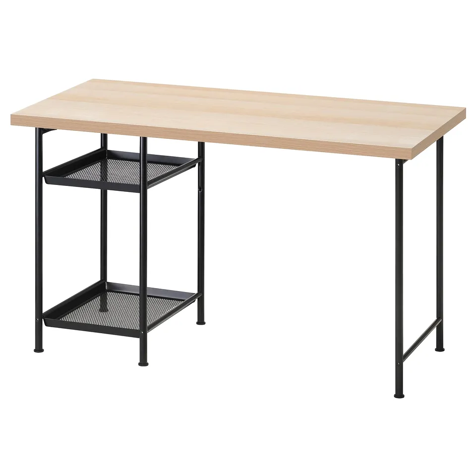 A LAGKAPTEN desk with a light wood top and black metal legs and mesh shelves. It has two adjustable shelves for storage.
