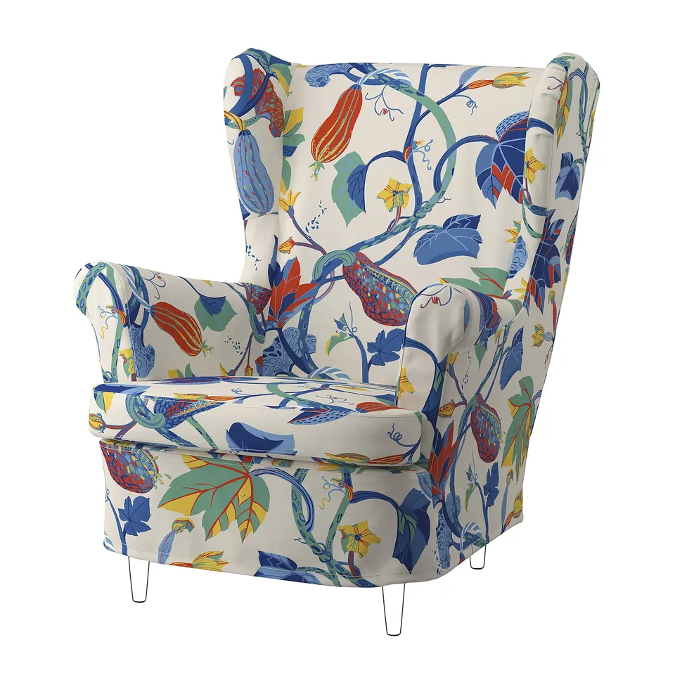 STRANDMON wing chair, bold floral print, white, colourful, crescent shape, high back, fabric cover.