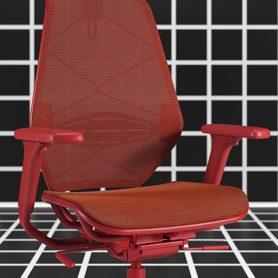 Red gaming chair with mesh back, adjustable seat, armrests, and lumbar support for comfort and customization.